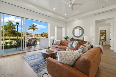 Living room with recessed lighting, a ceiling fan,
