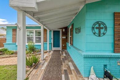 Covered tiled entryway to the home.