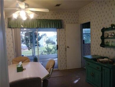Breakfast Room to Utility Rm and Screened lanai