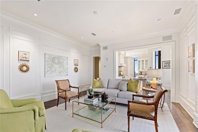 Living room with ornamental molding