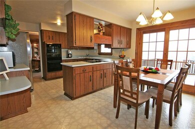 The kitchen has plenty of room for the cook AND he