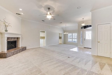 Unfurnished living room with crown molding, ceilin