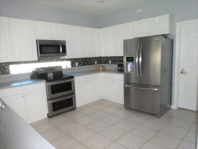 1401 Tiburon Ct, Riviera Beach, FL 33404 - photo 5