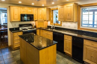 Large updated kitchen with striking new granite co
