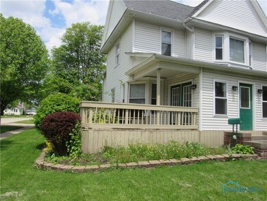 Nice outdoor deck off three seasons sunroom.