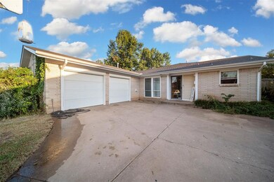 Single story home featuring a garage
