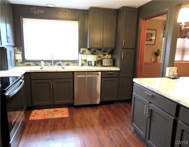 Another angle to show the floors, panty, dishwashe