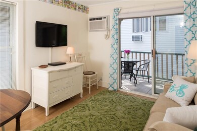 Living room with a ceiling fan which opens to the 