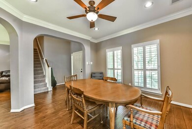 This great dining space could also be used as a sitting room, pool room, playroom, or study