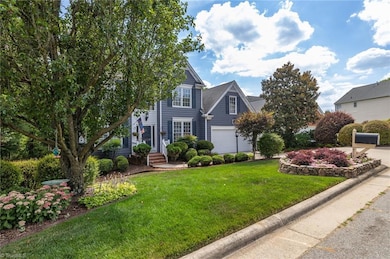 Alternate view of the front of the house encompassing more of the front yard view.