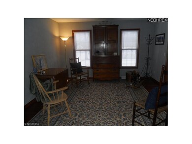 Living Room on one side of center hall