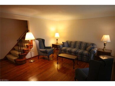 Large Living Room with beautiful wood floors.