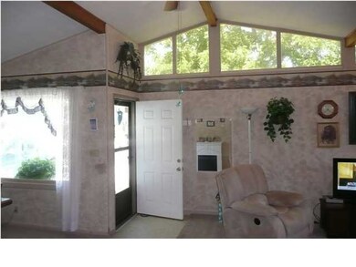 Beamed vaulted ceiling.