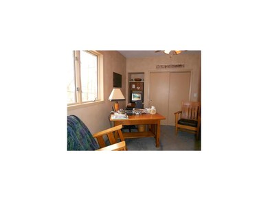Bedroom. Currently used as a den/study is this bri