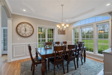 Off the foyer is the dining room.  Oversized, arch