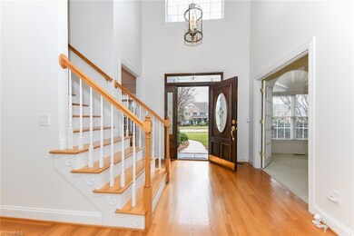 Dramatic two story foyer.