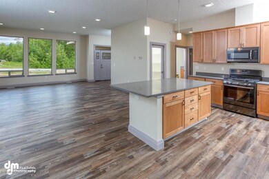Kitchen open to living/dining areas