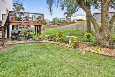 Pretty as a picture garden; note the large backyar