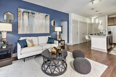Living room with wood-type flooring