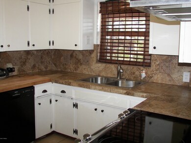 Kitchen with tile counters