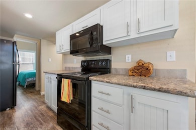 Full size microwave, range, and refrigerator conve