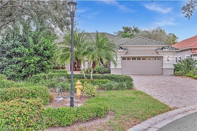 View of front of property with a garage