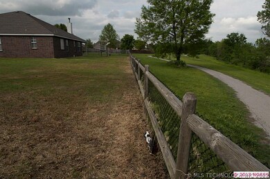 Back Yard with running track that runs behind the