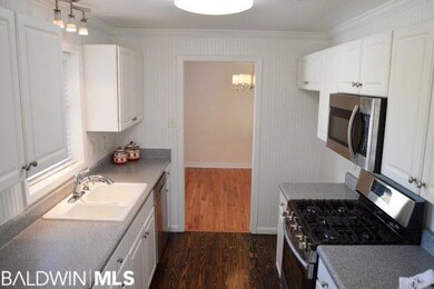 Galley Kitchen offers new light fixtures, new stainless range, oven micro-hood & dishwasher.
