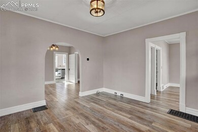 View of entry to dining room and bedroom.