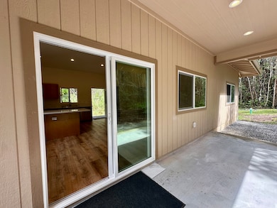 Second covered lanai with sliding door into dining room.