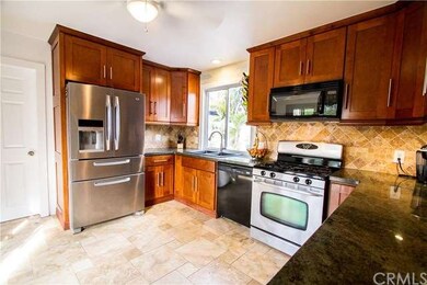 Updated kitchen.  Door as visible on the left lead