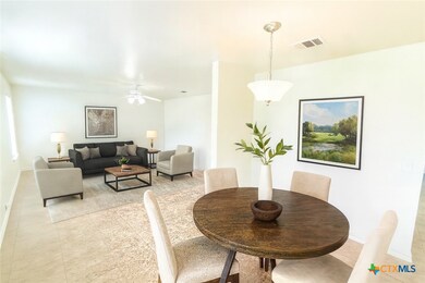 Virtually staged dining & second living space