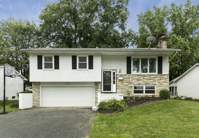 MADEOVER BI-LEVEL WITH 2 CAR GARAGE