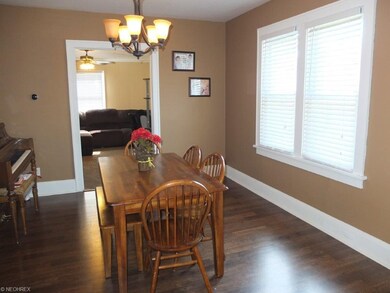 Formal dining room with new laminate flooring.