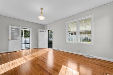 Empty room featuring light wood-type flooring