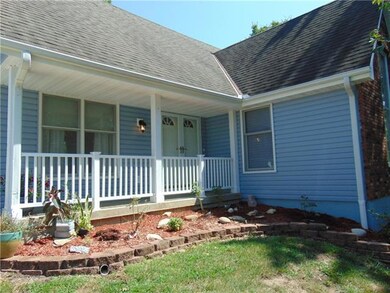 907 N Jackson St, Raymore, MO 64083 - photo 3