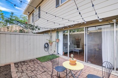 The private patio is located off the living room a