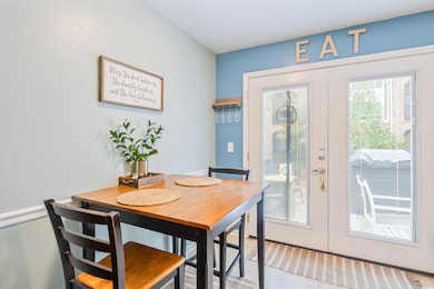 Dining room featuring plenty of natural light, lig