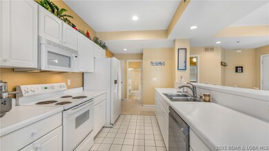 Kitchen with new fridge and dishwasher