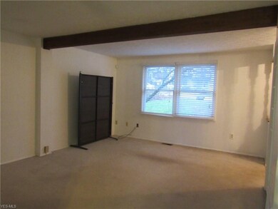 Living room views the front of the home