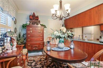 another dining room view showing opening to kitche