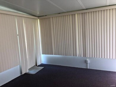 4 season room with vertical blinds and its own hea
