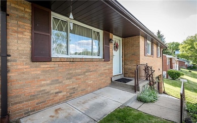 The front porch has plenty of room for a bistro se