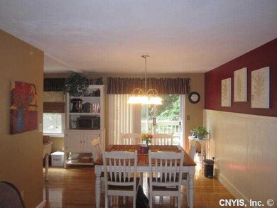 Dining Room Spacious dining room has wainscoting a
