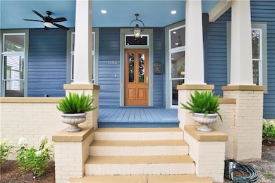 Entrance to property with a porch