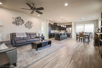 Stunning great room plan with shutters, ceiling fa