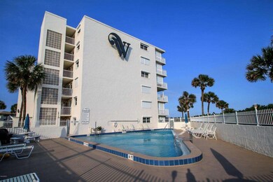1 Windjammer building with pool view