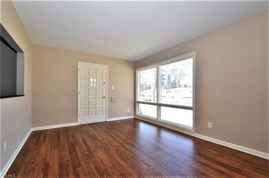 Great room has large double windows to let in tons