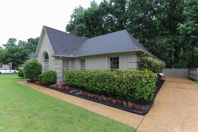 View of home along driveway! Lots of parking space