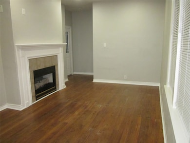 Living area with Mock Fireplace Beautiful Hardwood